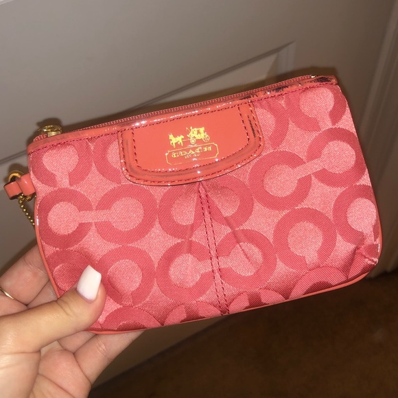 Coach Handbags - Coach classic salmon colored logo wristlet